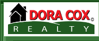 DORA COX REALTY, INC. Logo