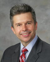 RE/MAX RESULTS REALTY Logo