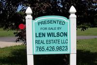 LEN WILSON REAL ESTATE, LLC Logo