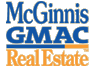 MCGINNIS GMAC REAL ESTATE Logo