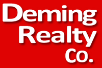 DEMING REALTY CO. Logo
