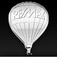 RE/MAX Complete Realty Logo