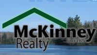 MCKINNEY REALTY Logo