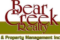 Bear Creek Realty and PM Logo